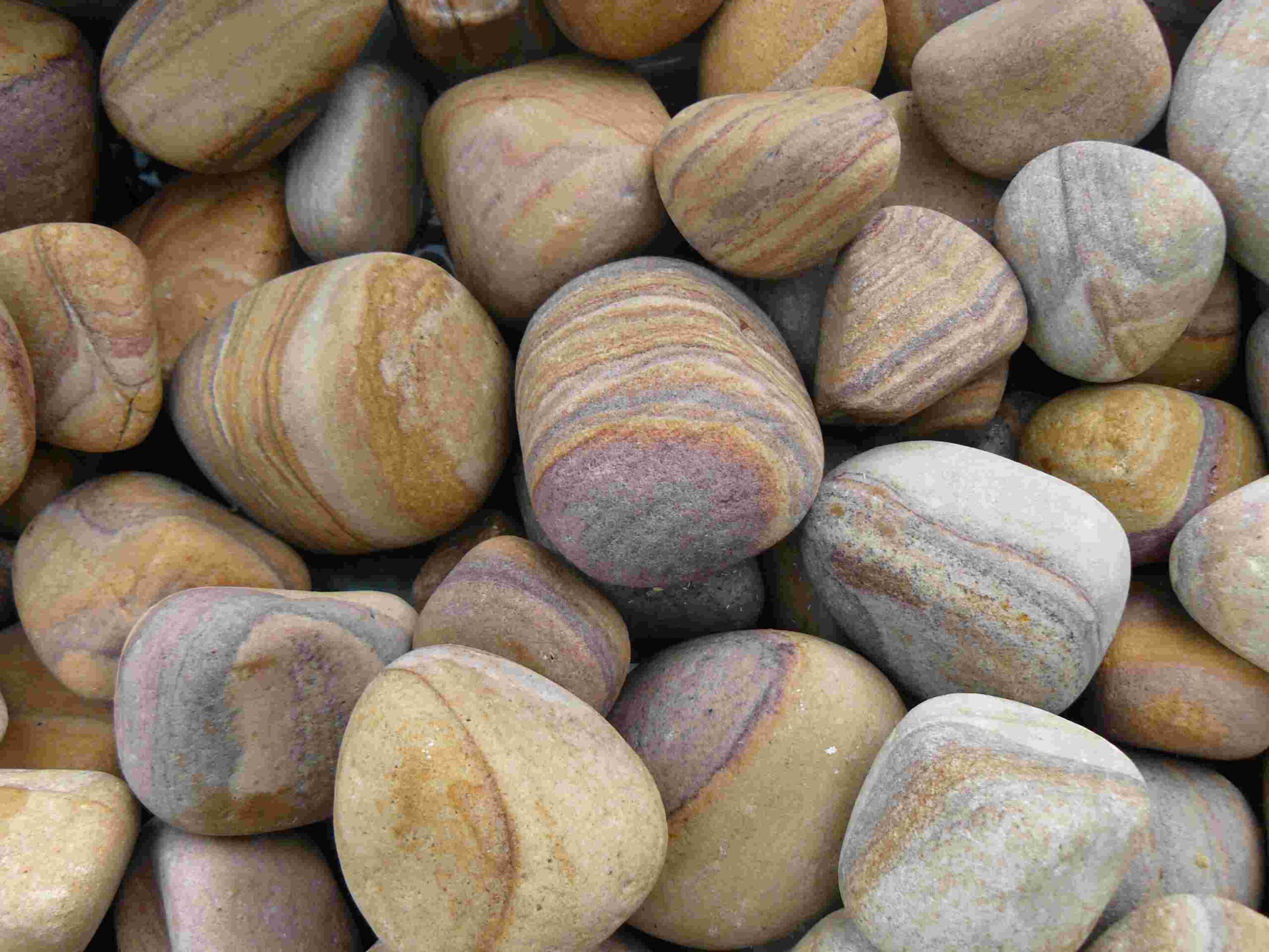 Decorative rainbow pebbles to accessorise your water features and gabions