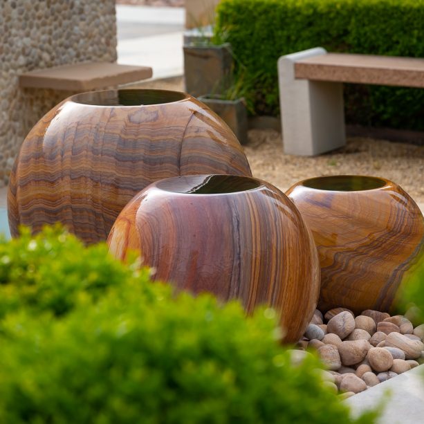 trio of stone sphere planters